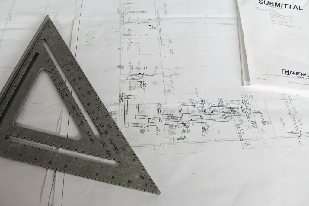 A blueprint with a protractor on it.